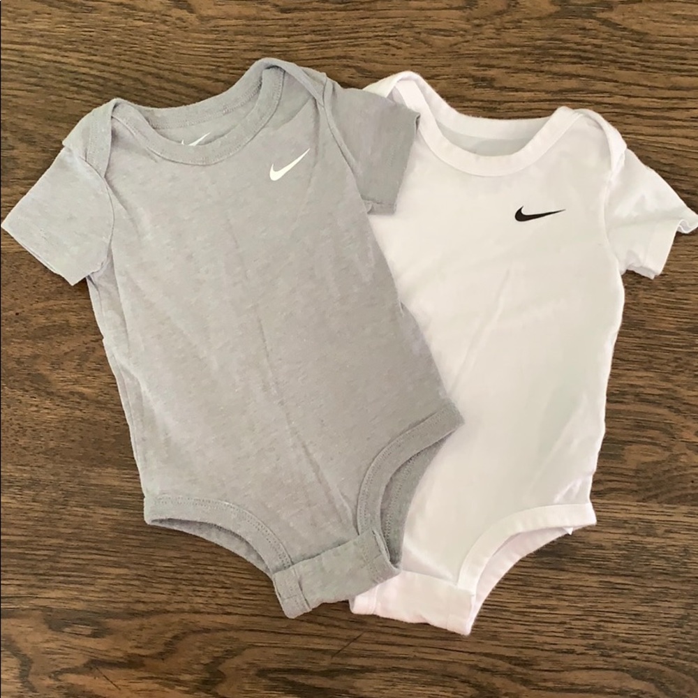 Pair of Nike Baby onesies. Size 9 months.